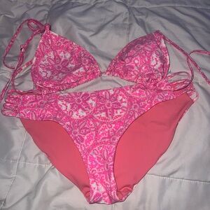 All pink with a little bit of blue swimsuit